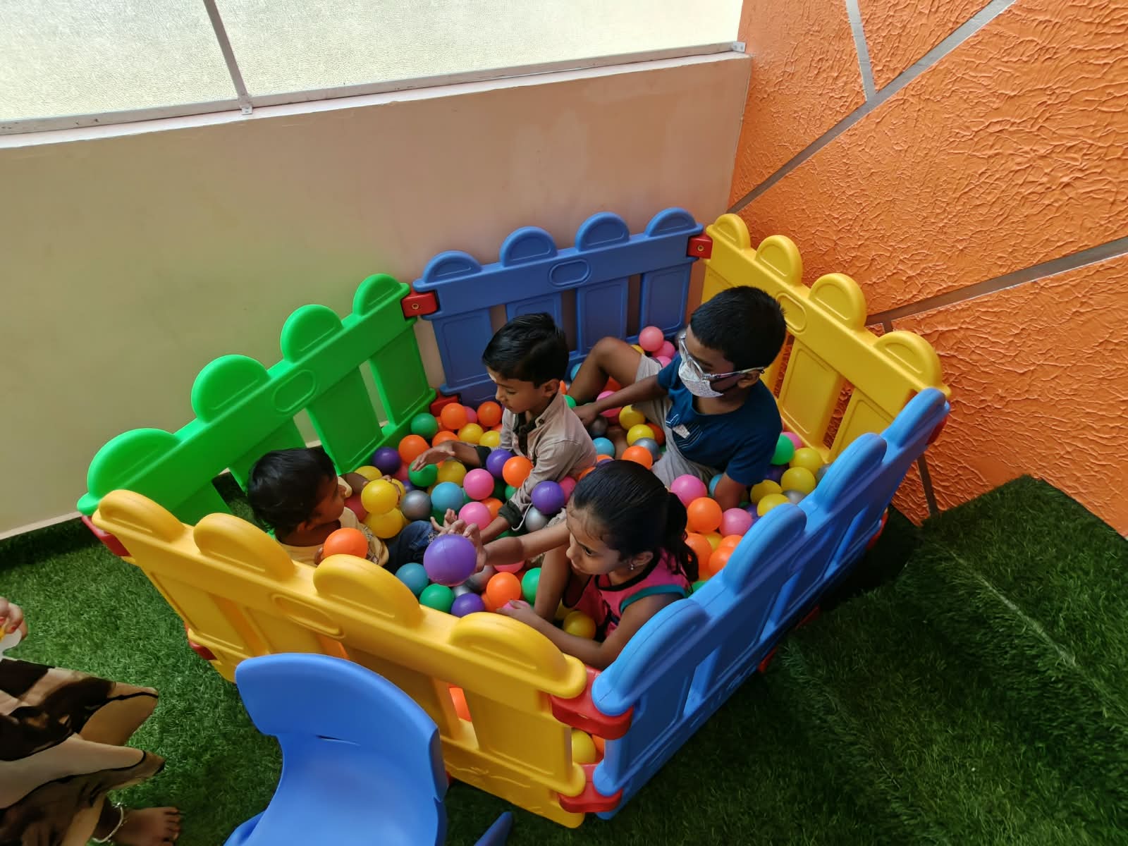 Children learning through play at Brightroots Kids Care