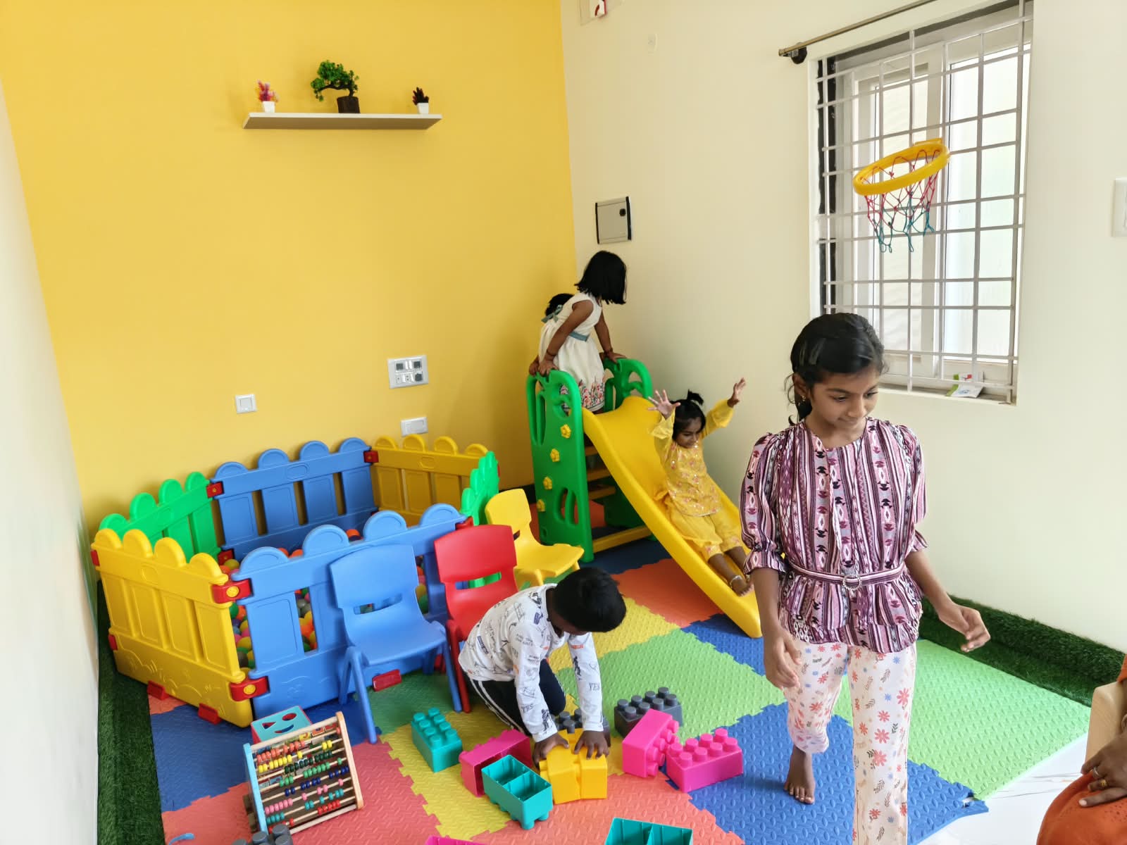 Children playing at BrightRoots Kids Care